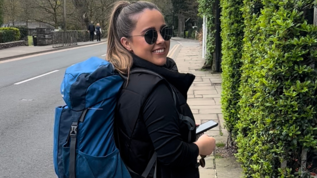Lauren in her backpack