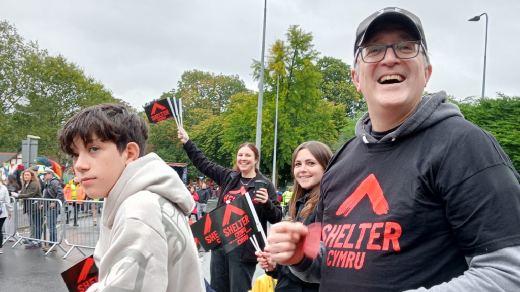 Volunteers cheering on Team Shelter Cymru at the Cardiff Half