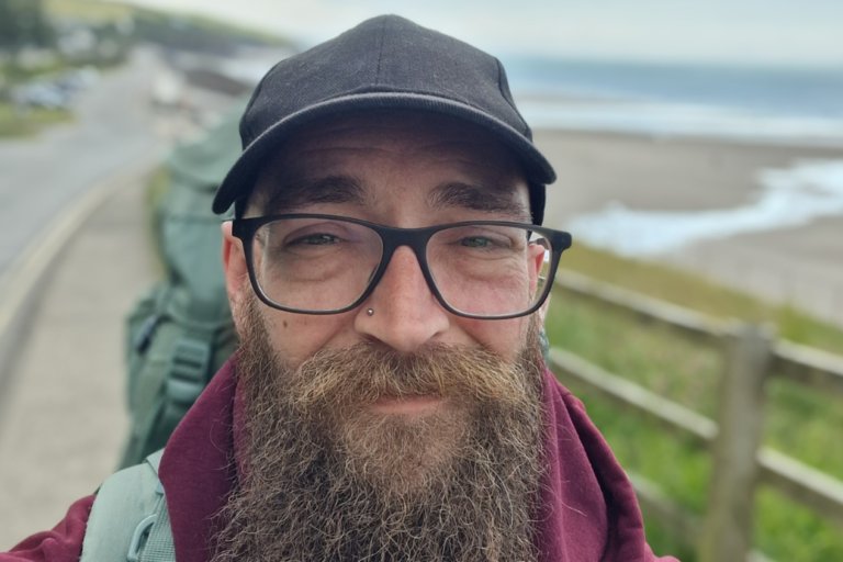 Kyle is hiking the coast path to raise money for Shelter Cymru