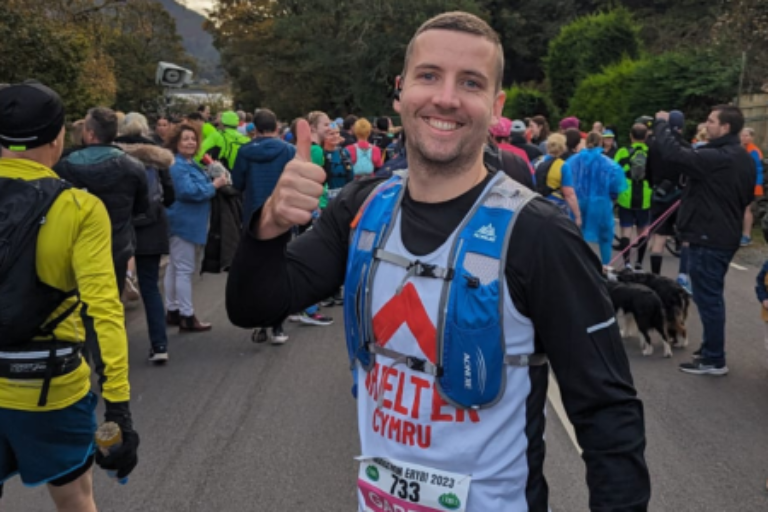 Marathon runner giving the thumbs up